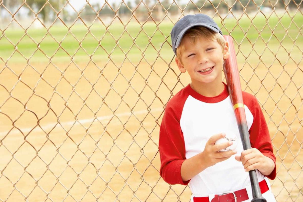 Young boy playing baseball
